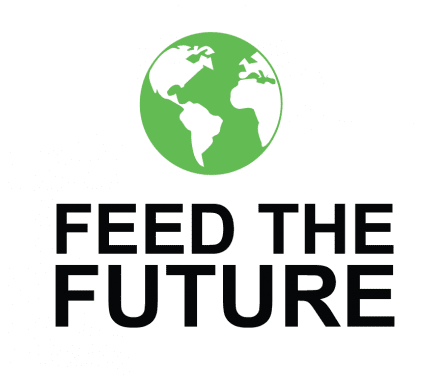 A green and white globe icon above bold black text that reads FEED THE FUTURE on a white background.